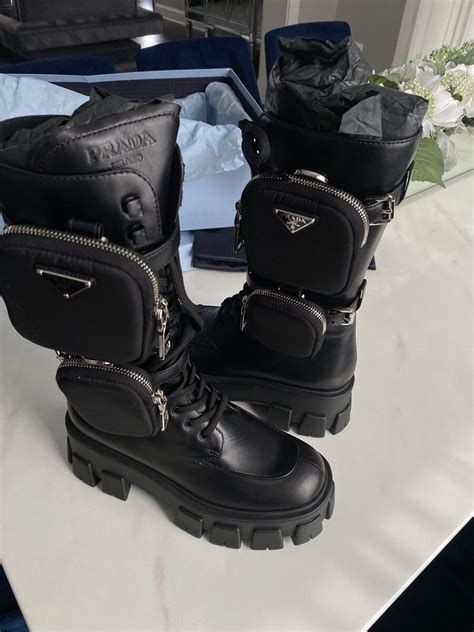 prada snow boots.|prada combat boots with pouches.